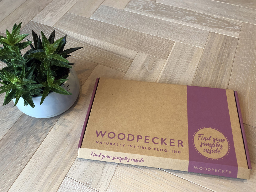 woodpecker samples box on feather oak parquet flooring