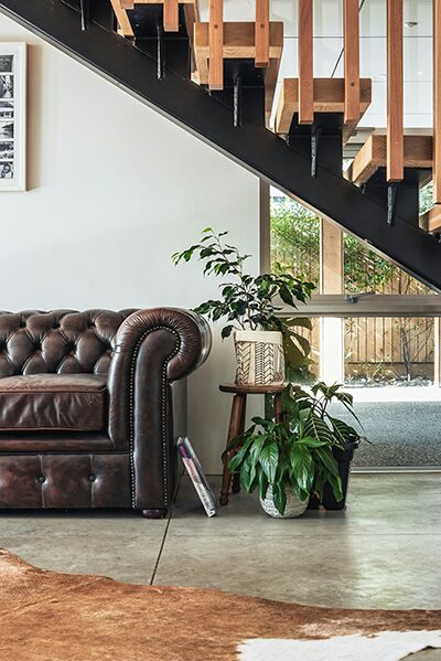 rustic-living-room-sofa-plants-krystal-black-unsplash