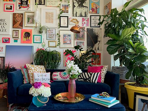 bohemian-living-room-decor-style-blu-sofa-picture-wall-frames-steph-wilson-unsplash.png
