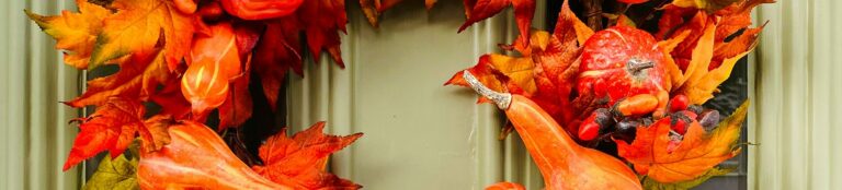 banner-autumn-wreath-door-frame-crown-unsplash.png