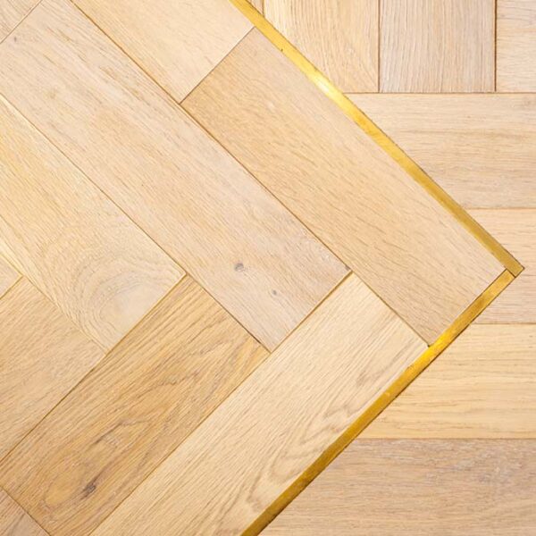 brass design strip for flooring