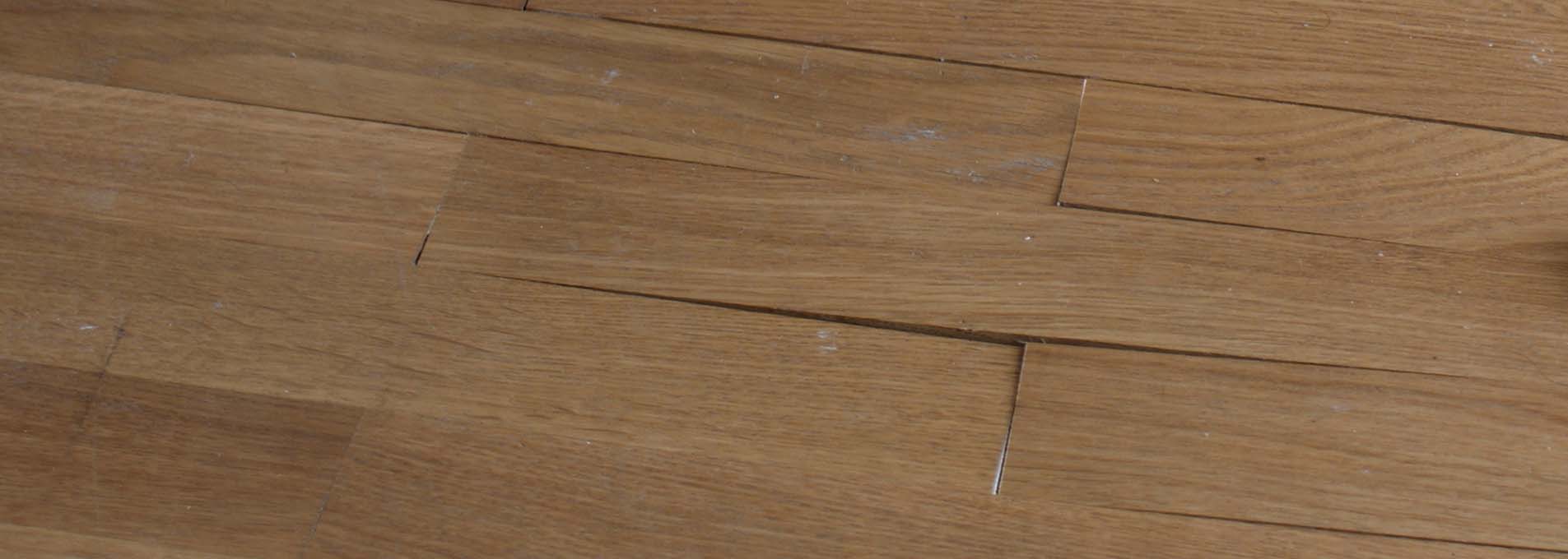 warped wooden flooring header