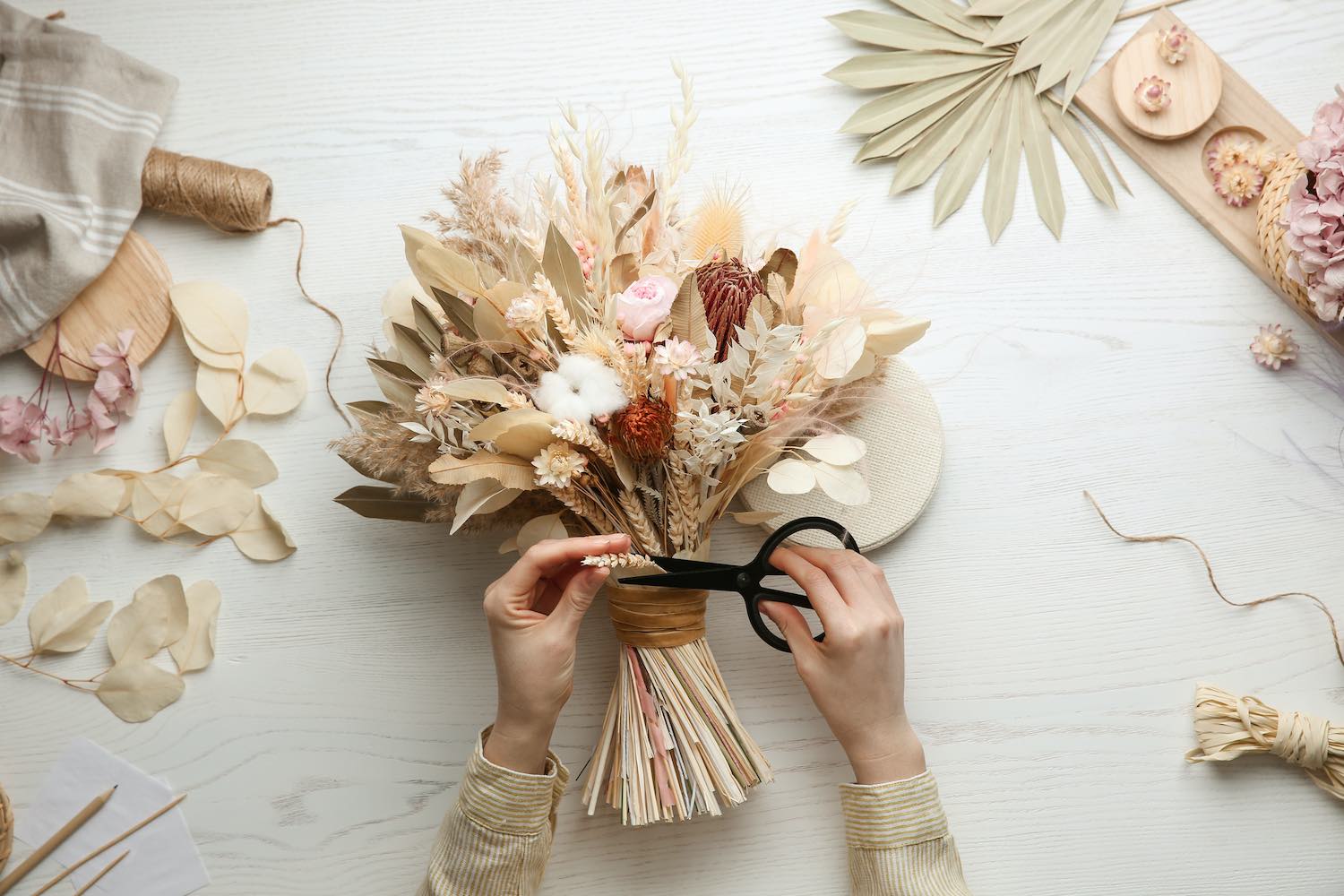 Making beautiful bouquet of dried flowers for fall