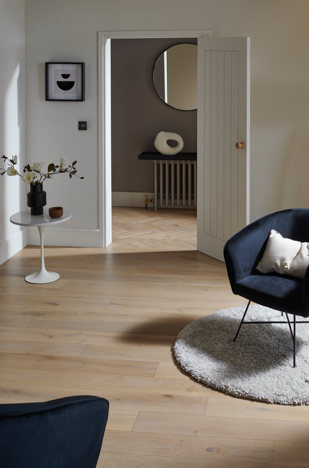 Engineered wood flooring in a living room. Harlech Ecru oak