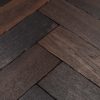 Dark engineered herringbone flooring
